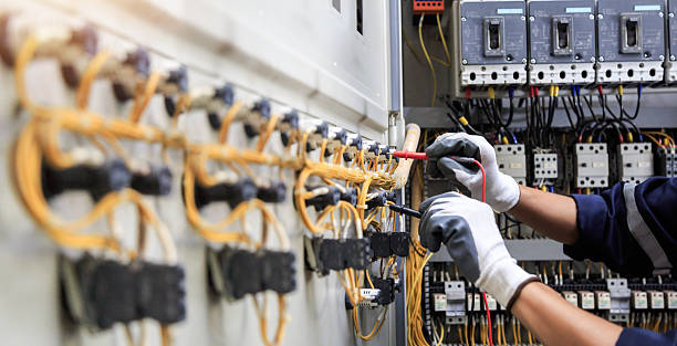Professional Electrician technician working in World Golf Village, FL